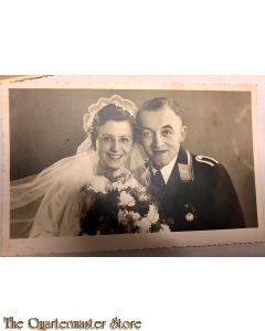 Studio portret decorated LW NCO and Bride